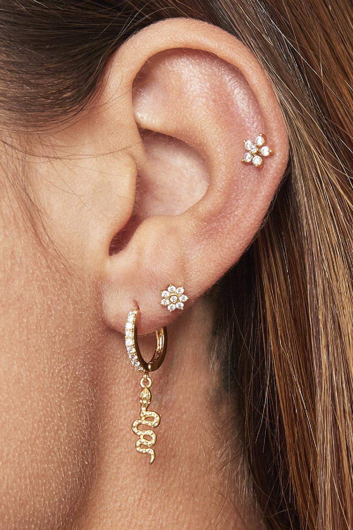 Bloem piercing goud en zilver