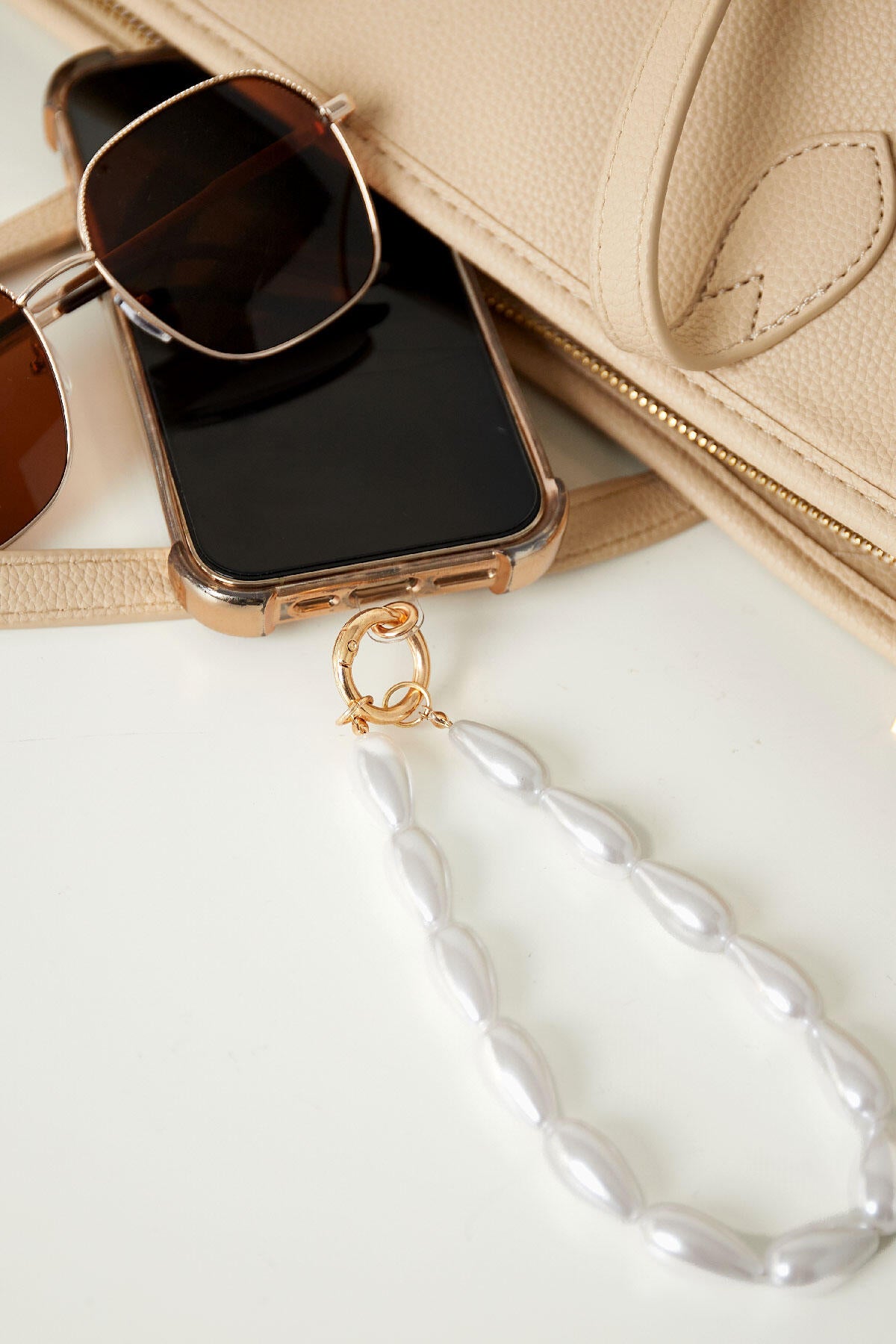 Stylish White Phone Chain for Secure Holding