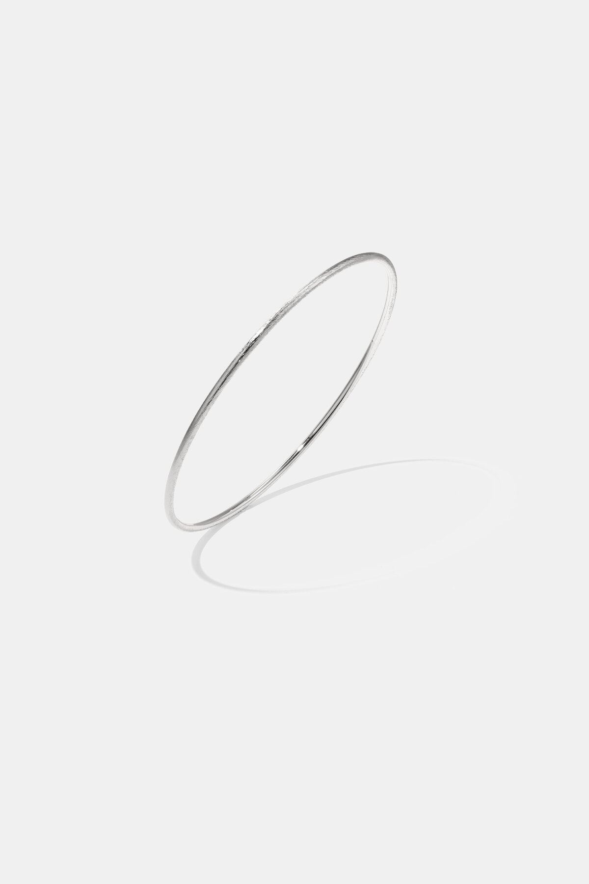 Elegant Lumé Stainless Steel Bangle for Everyday Wear