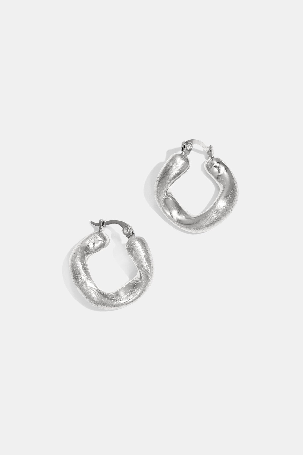 Elegant Lumé Stainless Steel Hoop Earrings